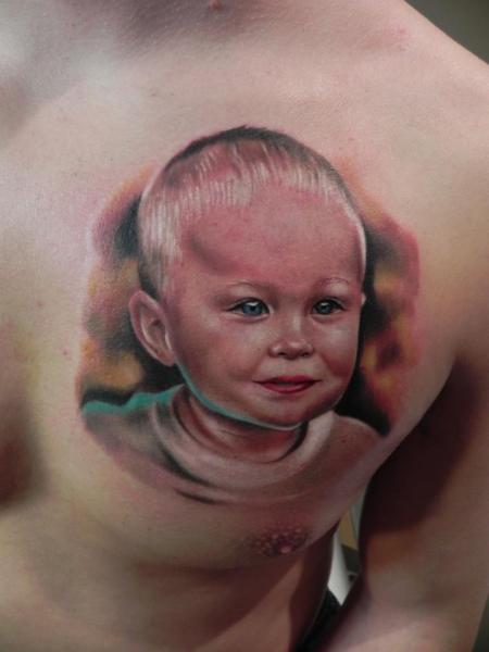 Realistic Chest Children Tattoo by Rock Ink