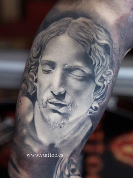 Arm Statue Tattoo by V Tattoos