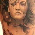 Women tattoo by V Tattoos