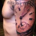 Arm Realistic Clock tattoo by Mia Tattoo