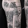 Schulter Arm Uhr Leuchtturm tattoo von Mia Tattoo