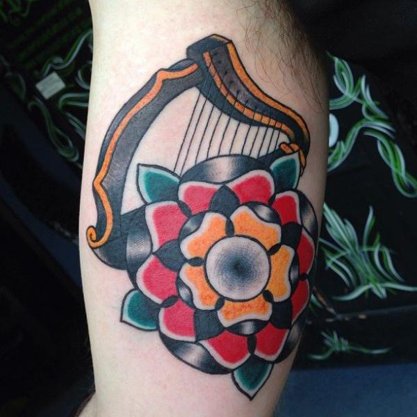 Arm Old School Flower Harp Tattoo by North Side Tattooz