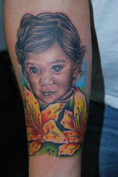 Arm Portrait Realistic Tattoo by Tatouage Chatte Noire