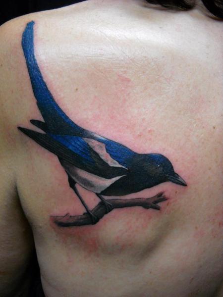 Realistic Back Bird Tattoo by Tatouage Chatte Noire