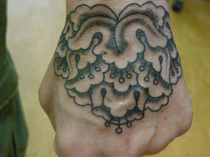 Old School Flower Hand Tattoo by Tatouage Chatte Noire