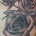 Realistic Flower Side tattoo by Tatouage Chatte Noire