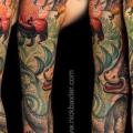Flower Dinosaur Sleeve tattoo by Nick Baxter