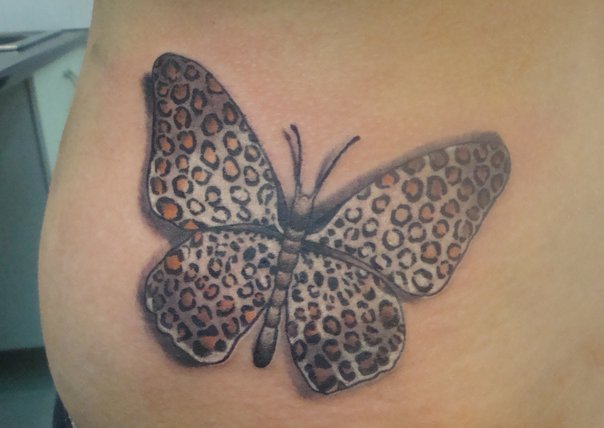 Side Butterfly Tattoo by Nirvana Tattoo