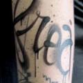 Arm Leuchtturm Fonts tattoo von Belly Button Tattoo