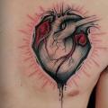 Chest Heart tattoo by Belly Button Tattoo