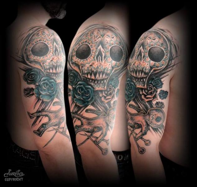 Shoulder Skull Puppet Tattoo by Belly Button Tattoo