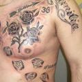 Chest Flower Lettering Rose tattoo by Tattoo Helbeck