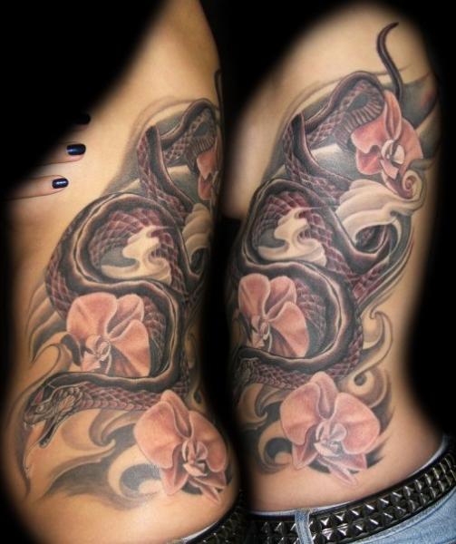 Snake Flower Side Tattoo by Mancia Tattoos