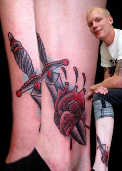 Old School Heart Leg Dagger Tattoo by Zoi Tattoo