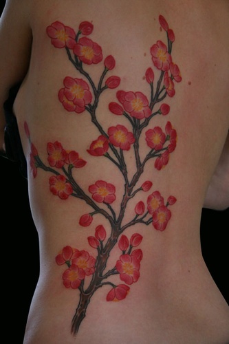 Realistic Flower Side Tattoo by 25 To Life Tattoos