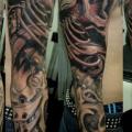 Biomechanical Skull Sleeve tattoo by Javier Tattoo