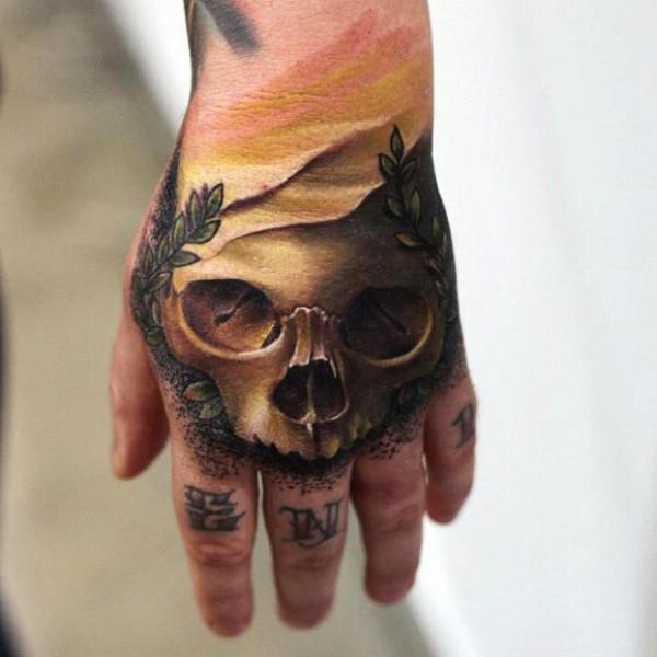 25 Frighteningly Cool Skeleton Hand Tattoo Designs  Pulptastic