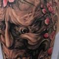 Schulter Arm Blumen Drachen Kirsche tattoo von Evil Twins Tattoo