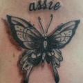 Realistic Lettering Butterfly Breast tattoo by Art 4 Life Tattoo