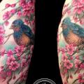 Realistic Flower Cherry Bird Thigh tattoo by Jo Harrison