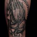 Arm Praying Hands tattoo by Nick Bertioli
