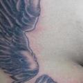 Seite Flügel tattoo von Tora Tattoo