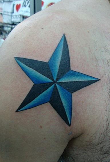 Shoulder Star Tattoo by Bird Tattoo