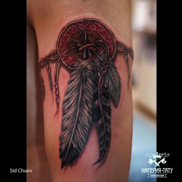 Tatuaje Brazo Realista Atrapasueños por Tattoo Empire