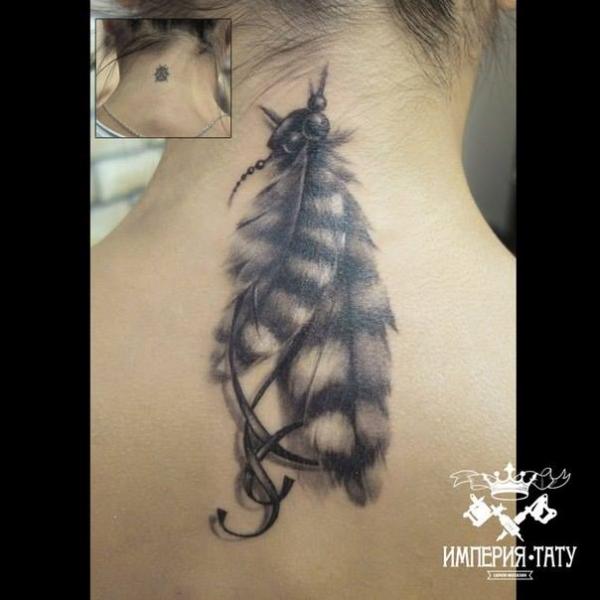 Feather Neck Tattoo by Tattoo Empire