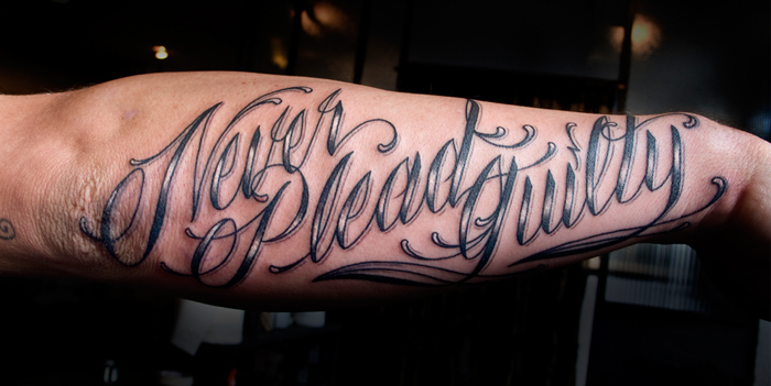 Arm Lettering Tattoo by Saved Tattoo