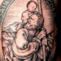 tatuaje Brazo Religioso Santo por Saved Tattoo