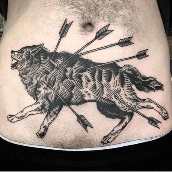 Wolf Belly Arrow Tattoo by Saved Tattoo