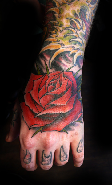 Old School Flower Hand Tattoo by Saved Tattoo