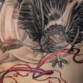 Realistic Chest Crow tattoo by Rock n Roll Tattoo