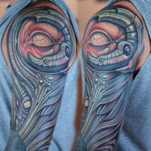 Shoulder Arm Biomechanical Tattoo by Graven Image