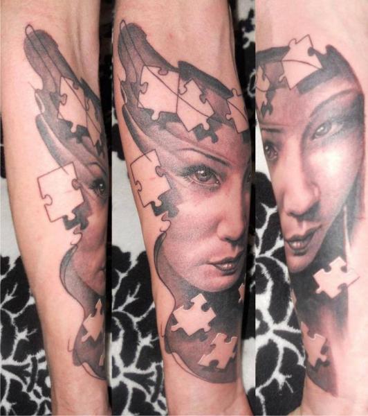 Arm Women Puzzle Tattoo by Tattoos by Mini