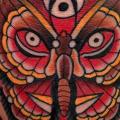Old School Hand Moth tattoo by Montalvo Tattoos