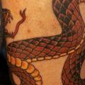 tatuaggio Braccio Serpente di Spilled Ink Tattoo