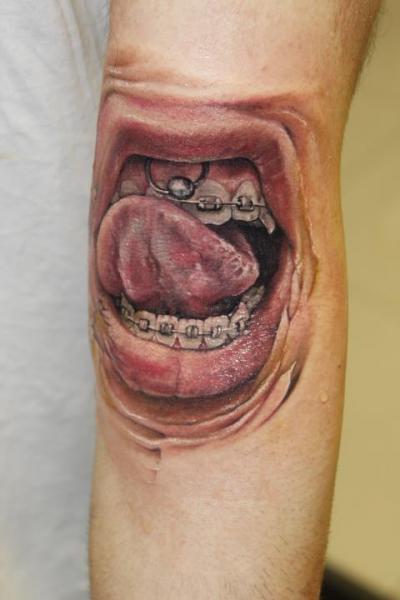 Arm Realistic Mouth Tongue Tattoo by Victor Chil