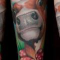 Arm Cow tattoo by Triple Six Studios