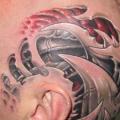 Biomechanical Head tattoo by Fatink Tattoo