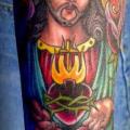 tatuaje Brazo Jesús Religioso por Salt Water Tattoo