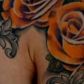 Shoulder Realistic Flower tattoo by Tim Mc Evoy