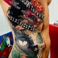 Side Skull Trash Polka tattoo by Kronik Tattoo