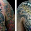 Shoulder Japanese Carp Koi tattoo by Darwin Enriquez