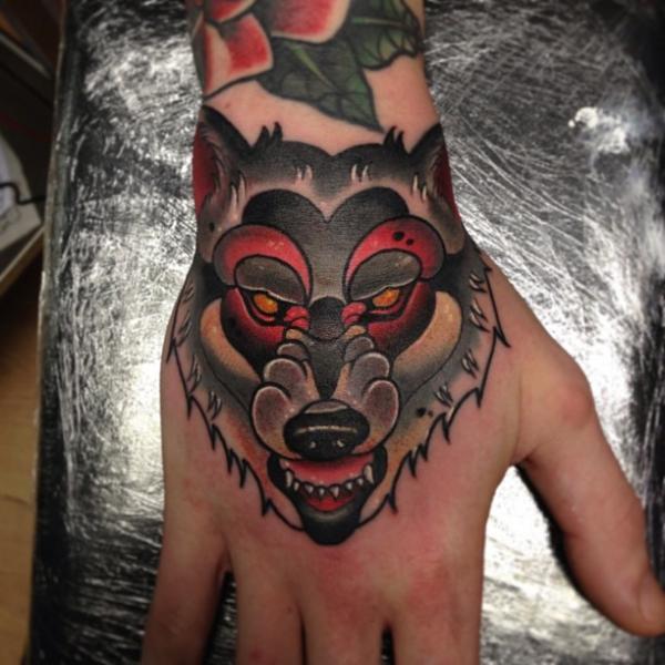 Old School Hand Wolf Tattoo by Mike Stocklings