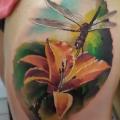 Realistic Flower Dragonfly Thigh tattoo by Sile Sanda
