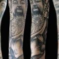 Buddha Religious Sleeve tattoo by The Lace Makers Sweat Shop