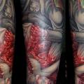 tatuaje Brazo Fantasy Sangre por Tim Kerr