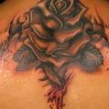 Flower Back Scar tattoo by Tim Kerr